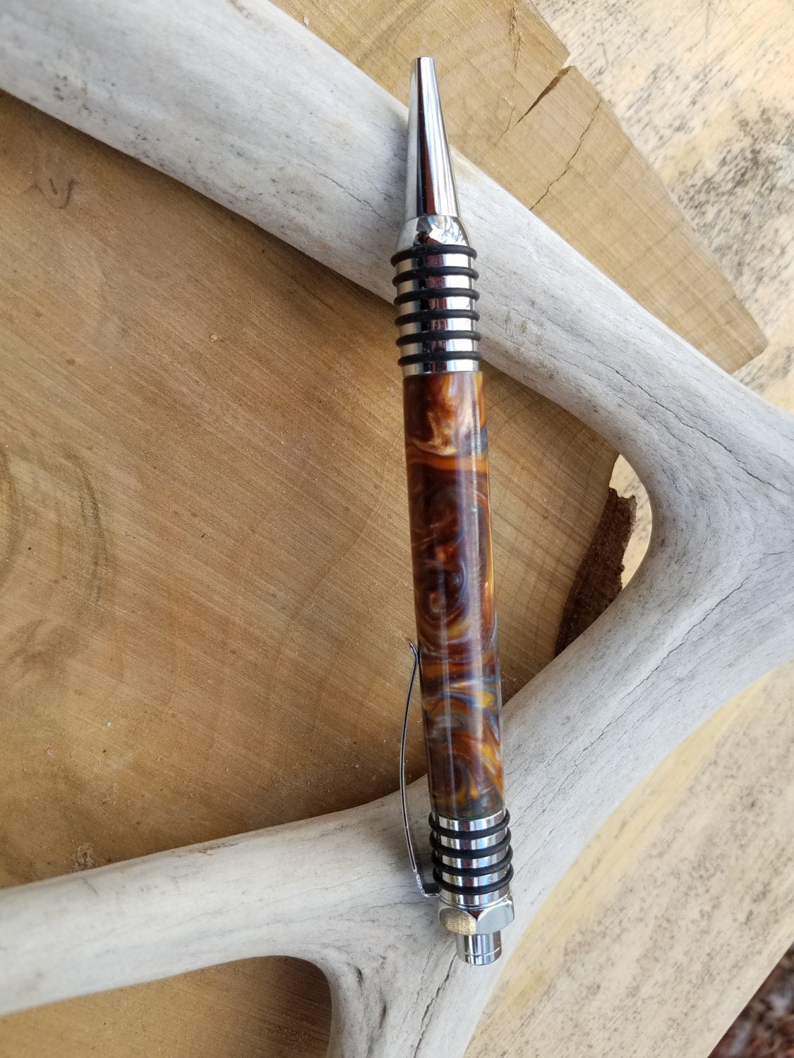 Spartan Click pen made from molten lava acrylic