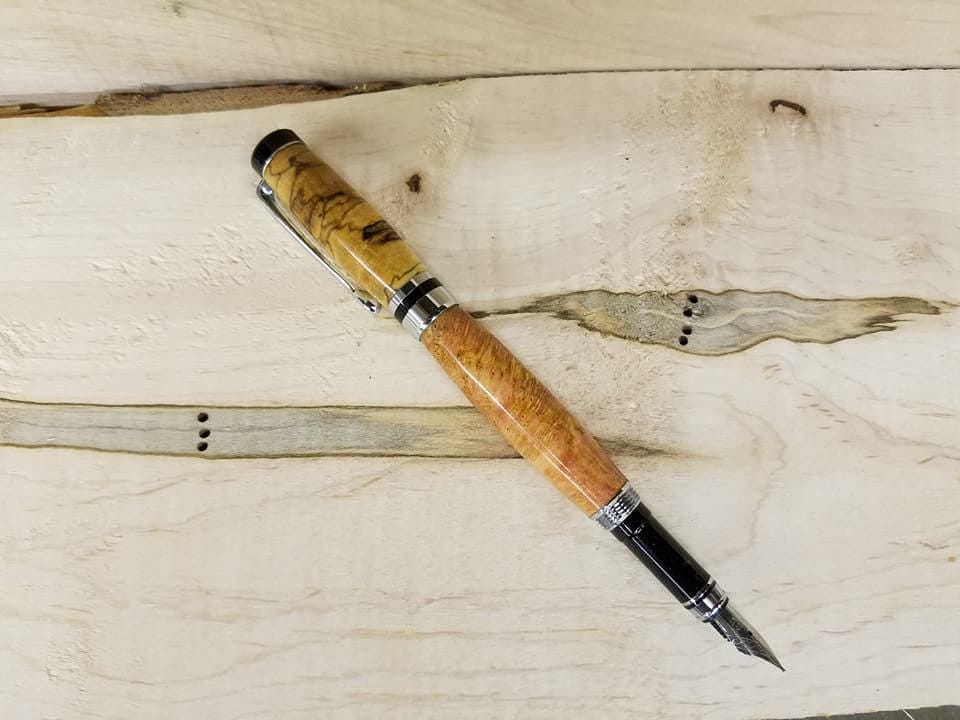 Traditional fountain pen made from spalted elm burl and black cherry burl