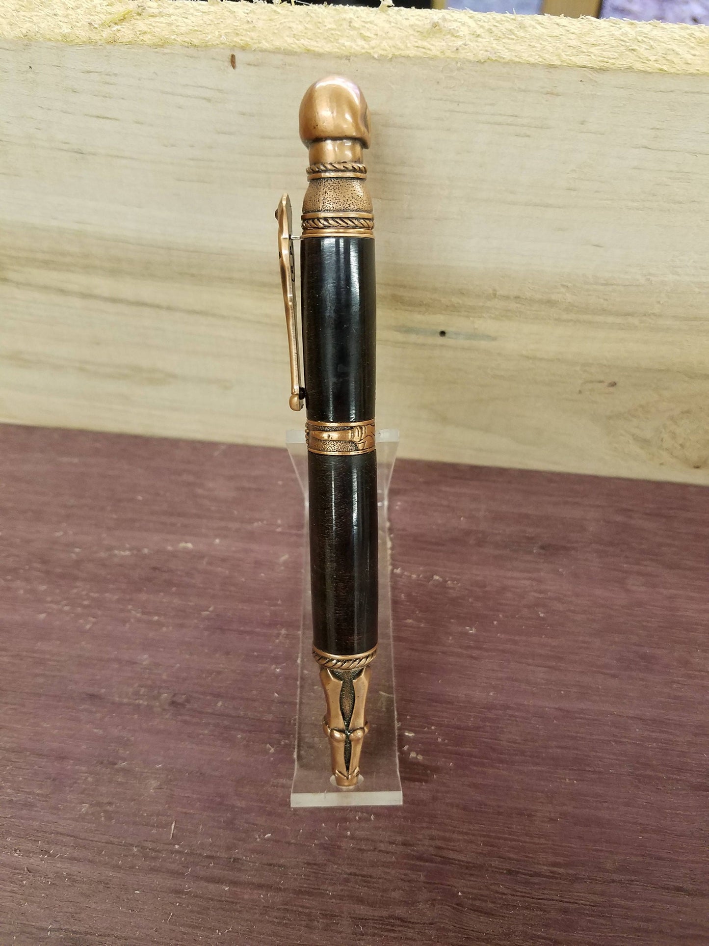 Skull pen made from double dyed black and red buckeye burl