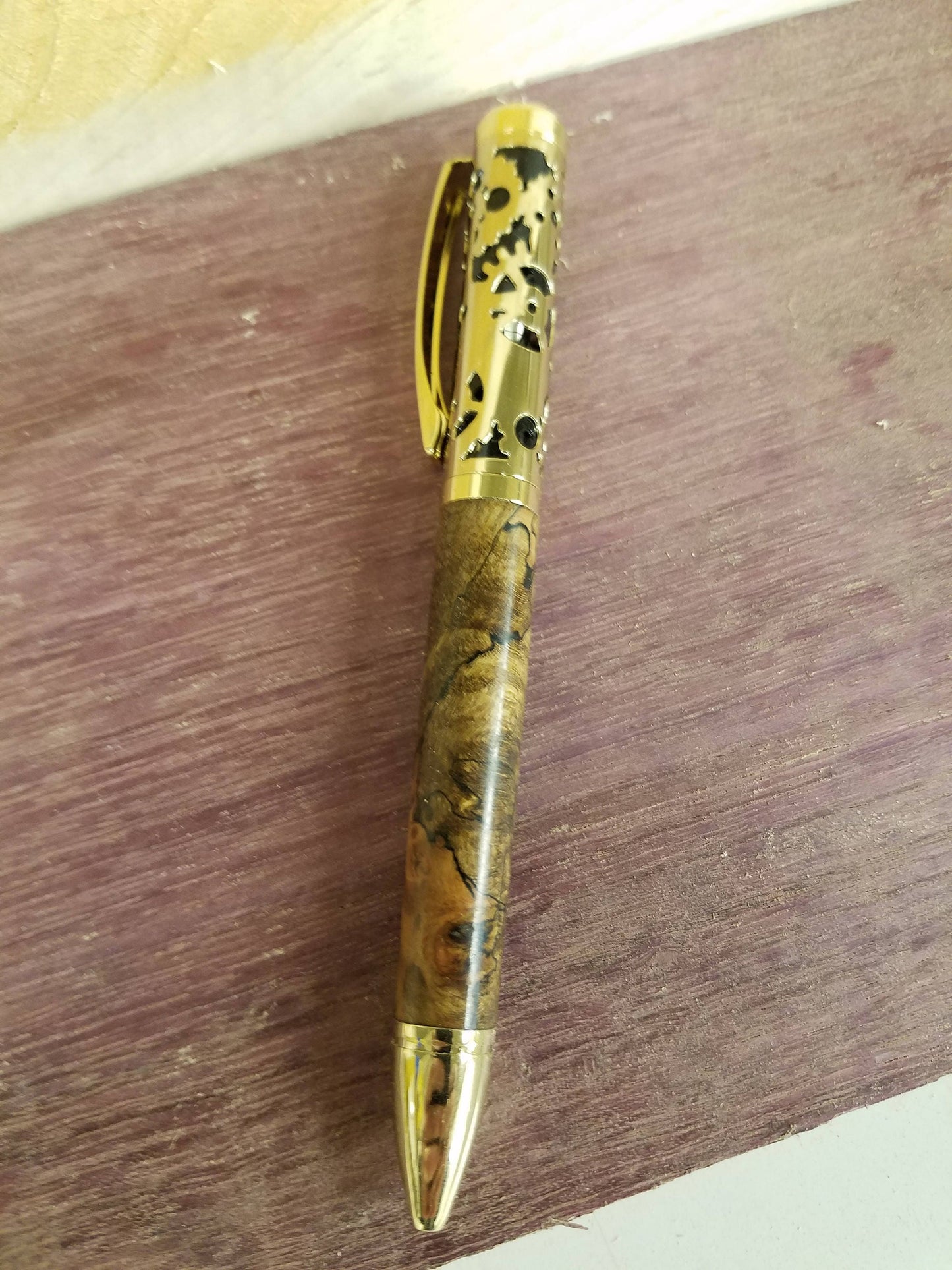 Filigree twist pen made from burl