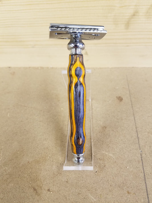 Double edged safety razor made from dyed spectraply