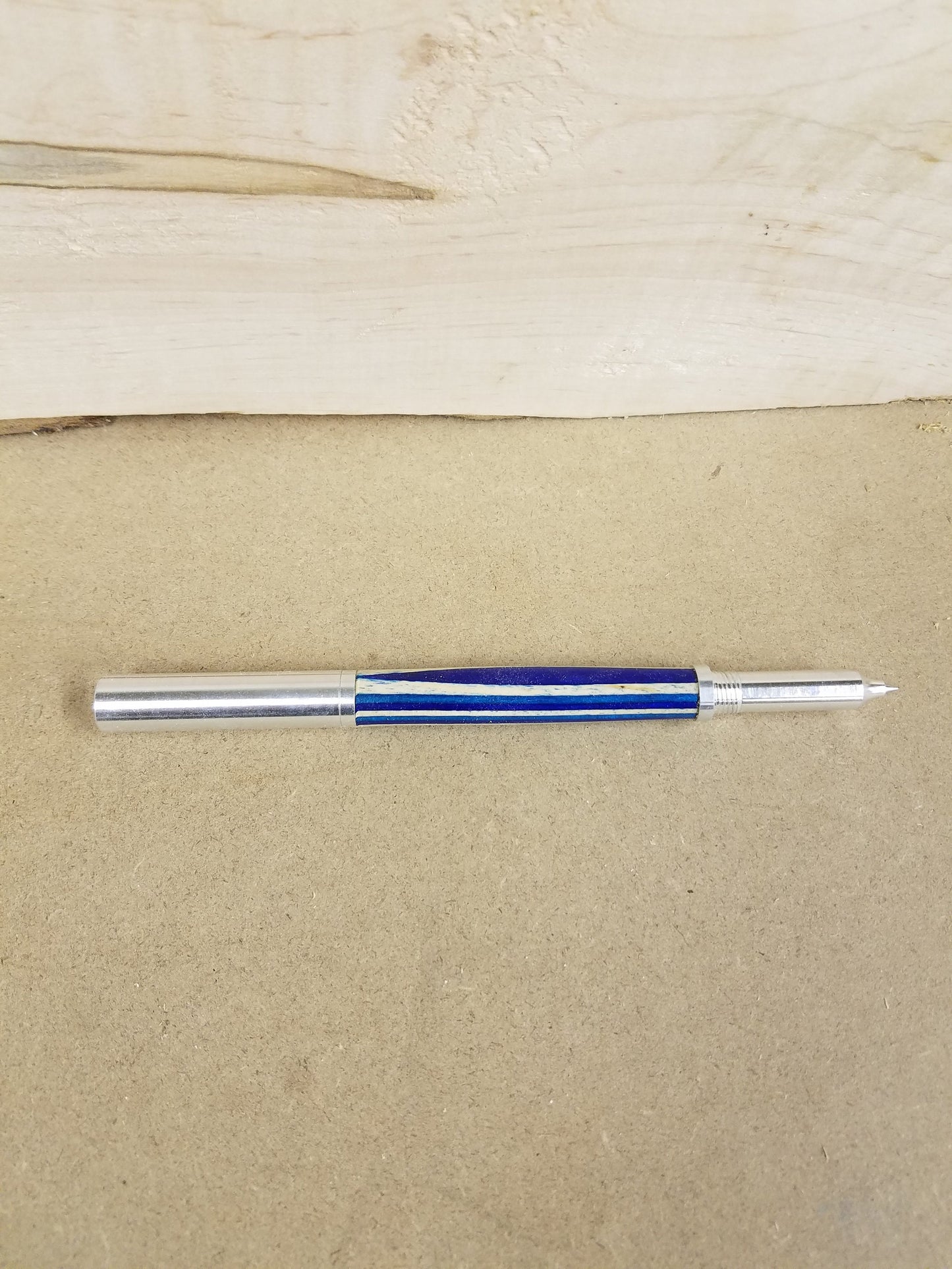 RAW pen made from blue and white spectraply