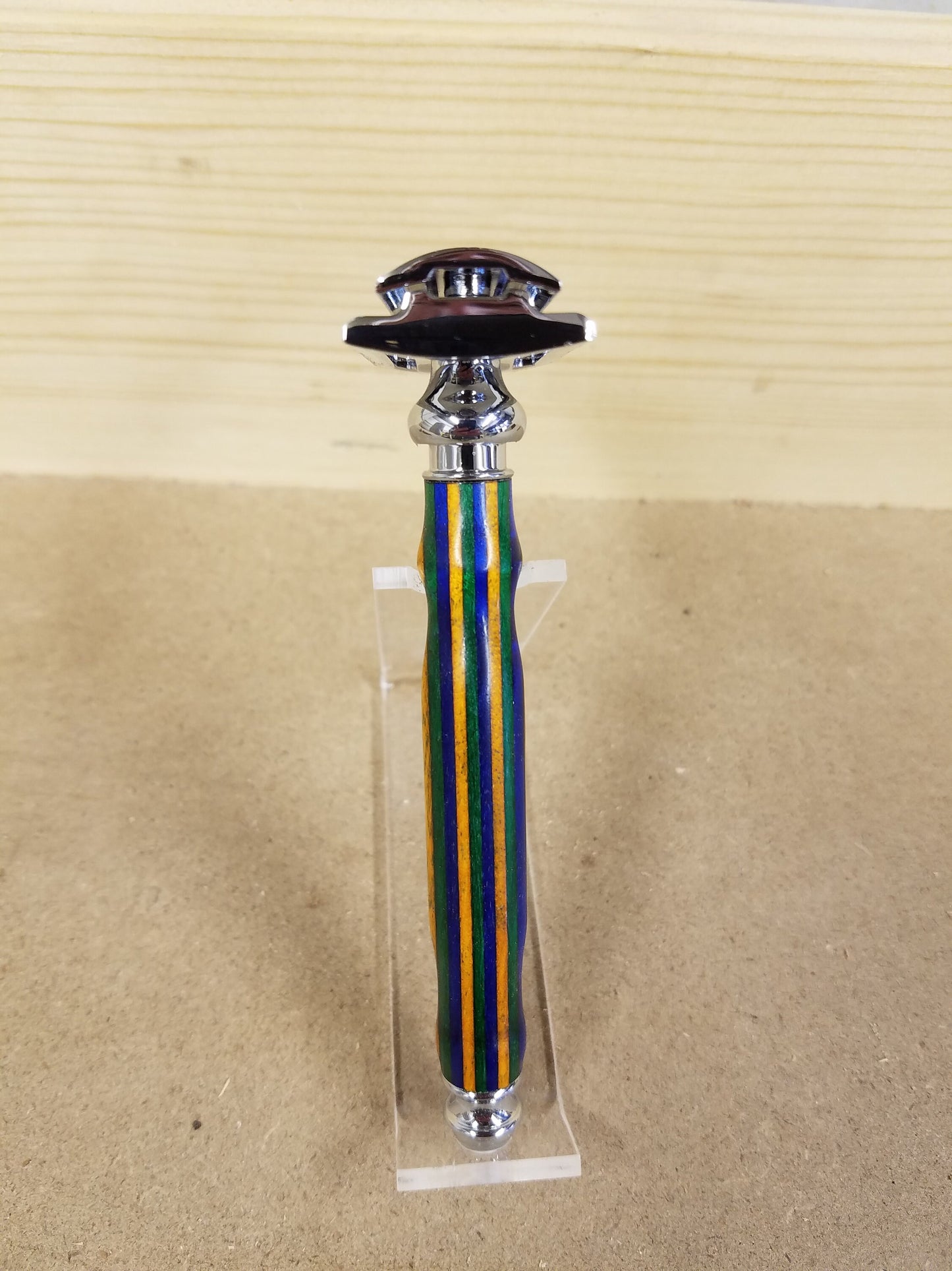 Double edged safety razor made from multi-colored spectraply wood