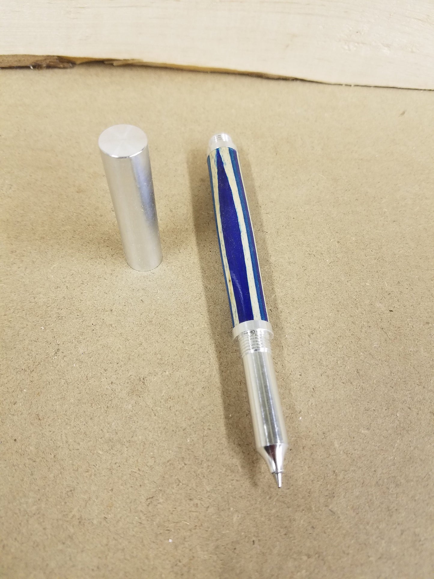 RAW pen made from blue and white spectraply