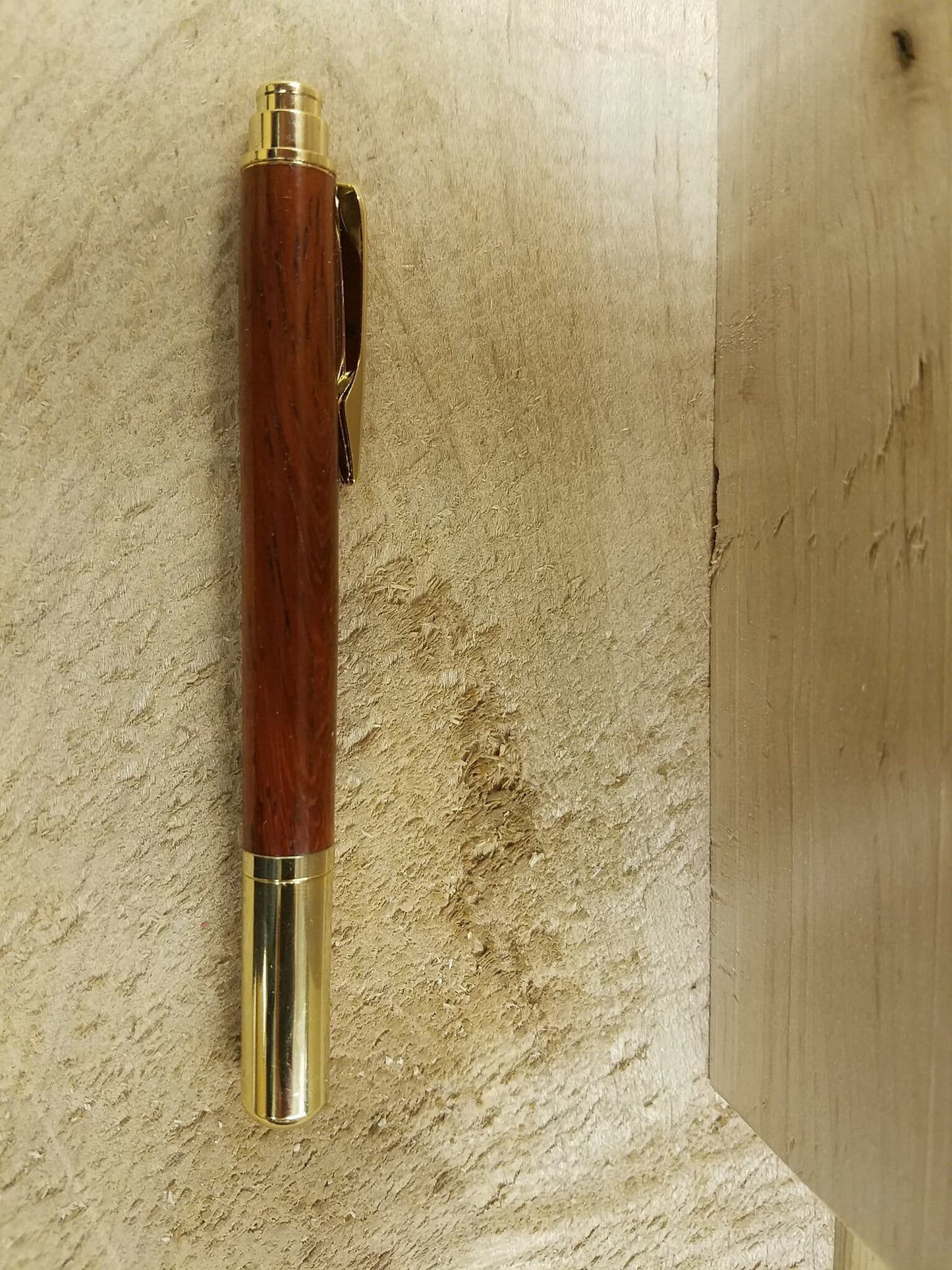 Gold plated Rollster pen made from Padauk