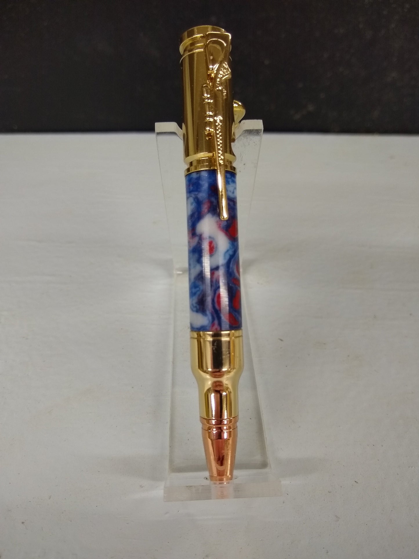 Mini 30 caliber bolt action rifle pen made from patriotic red, white and blue acrylic