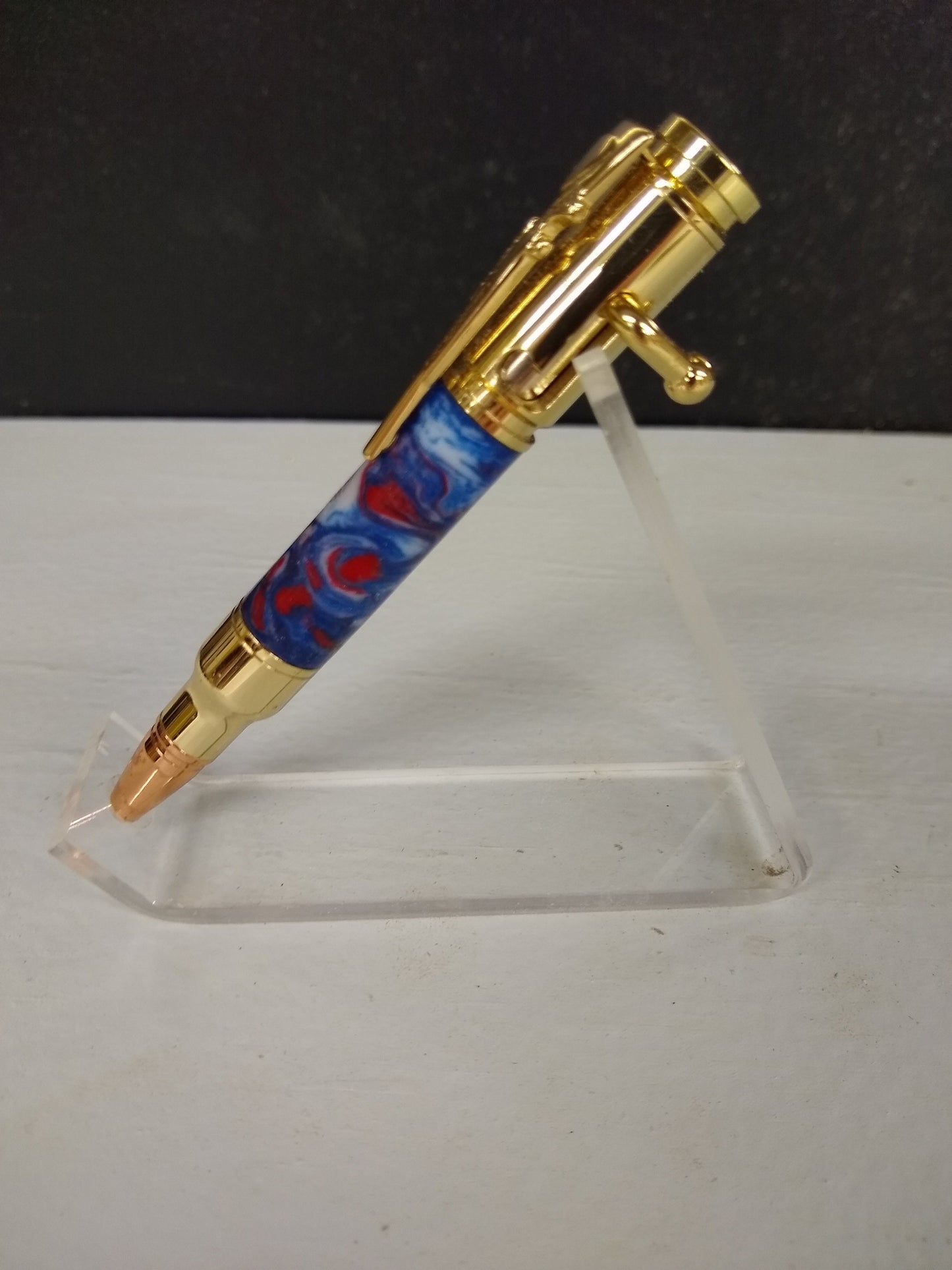 Mini 30 caliber bolt action rifle pen made from patriotic red, white and blue acrylic