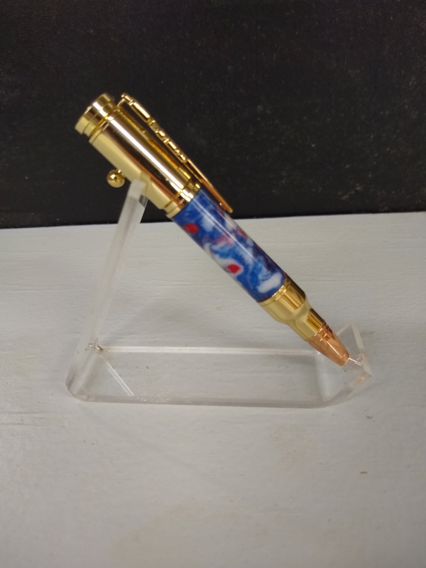 Mini 30 caliber bolt action rifle pen made from patriotic red, white and blue acrylic