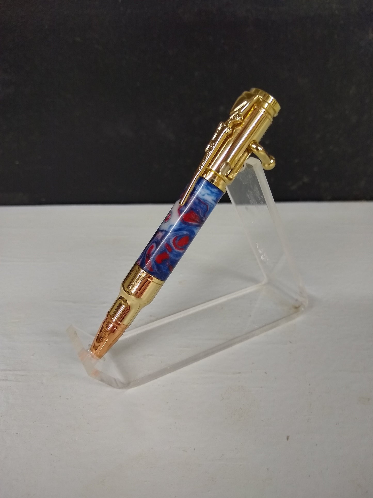 Mini 30 caliber bolt action rifle pen made from patriotic red, white and blue acrylic