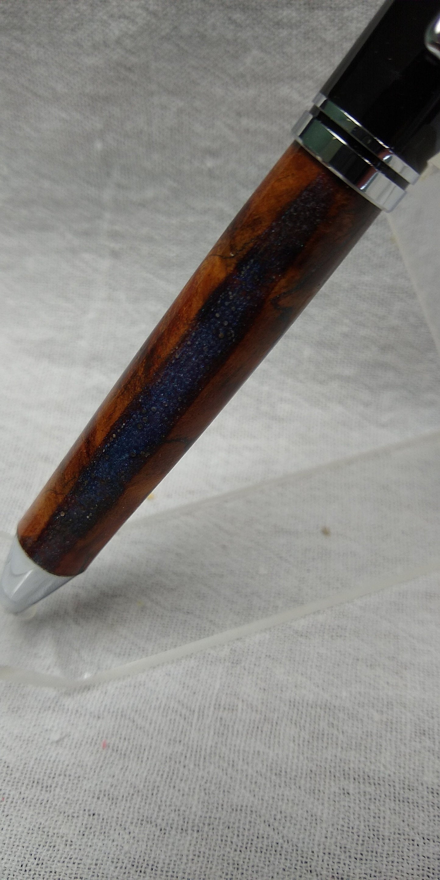 Oxford twist pen with blue acrylic river on Eucalyptus wood