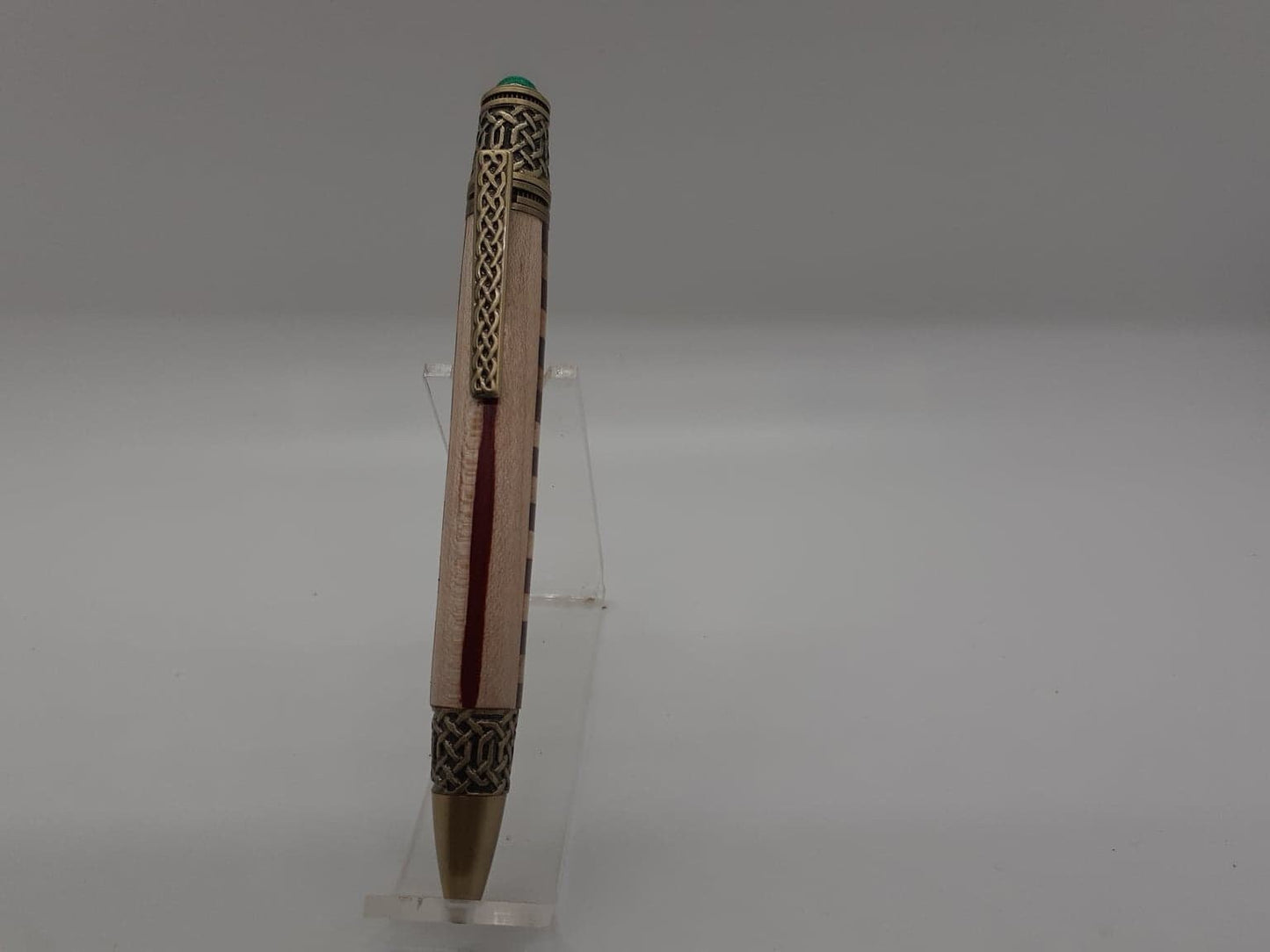 Celtic twist pen made from Padauk and Maple wood and antique copper