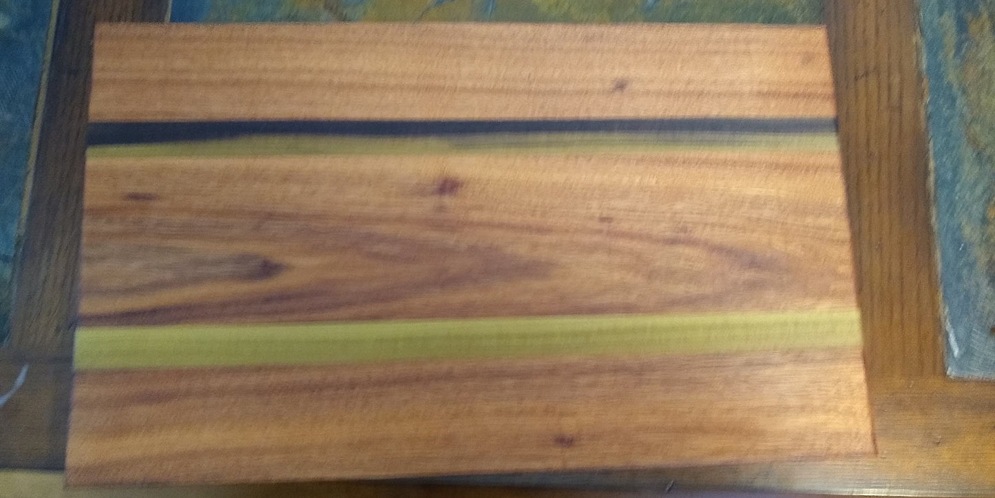 Cutting board from multiple types of wood