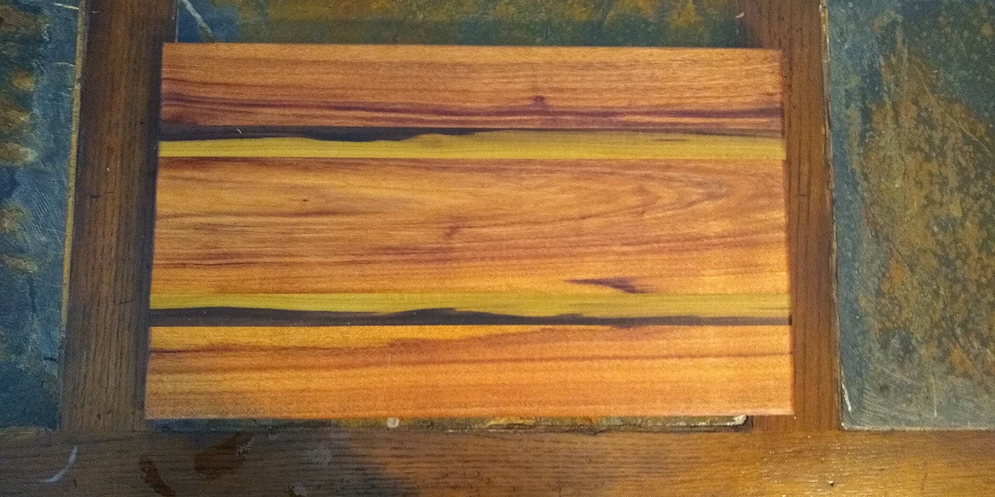 Cutting board from multiple types of wood