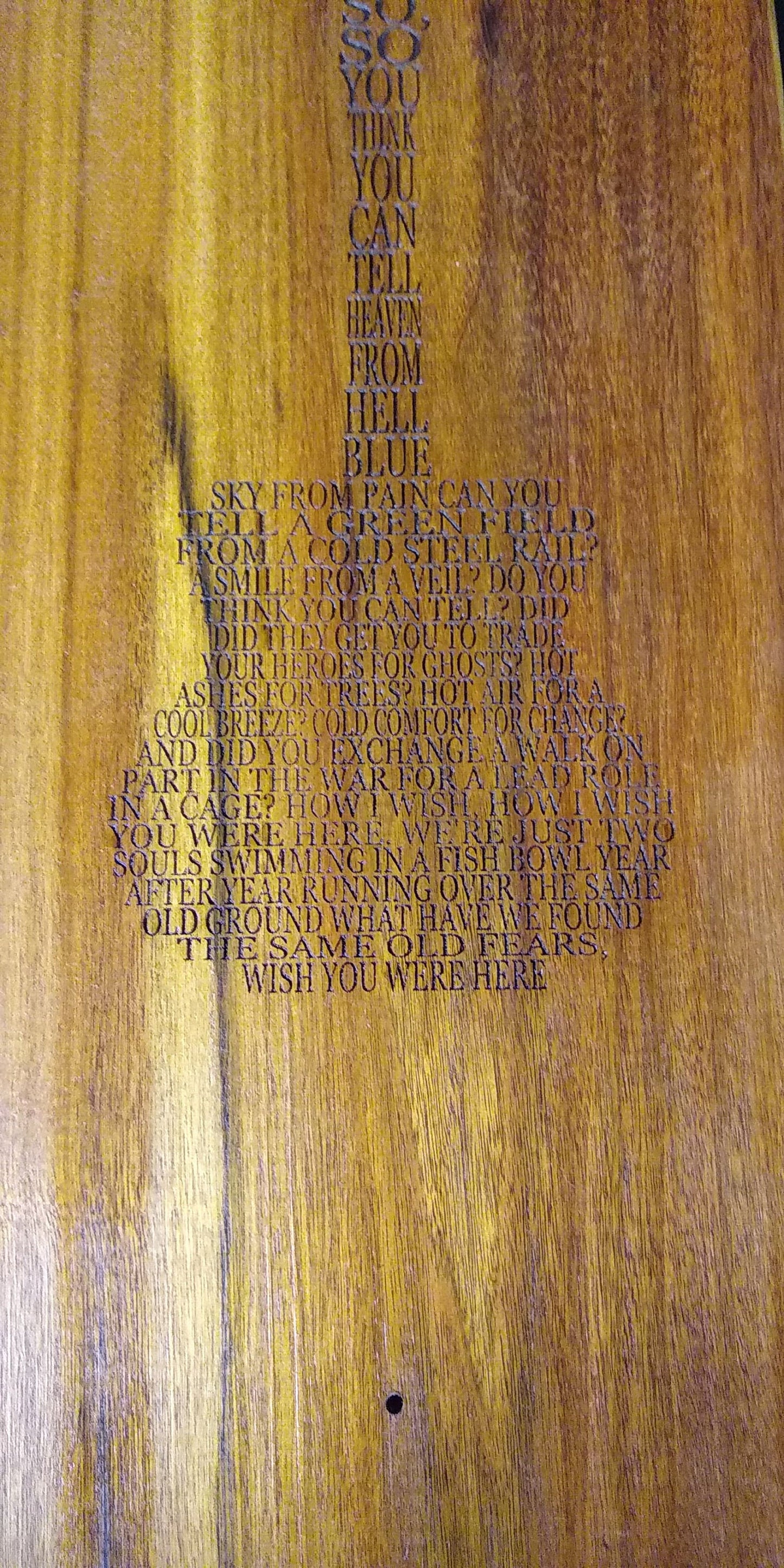 Custom guitar wall hanger on Curapay wood laser inscribed Pink Floyd's "Wish you were Here" lyrics