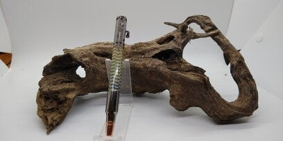 Gun Metal Bolt Action Pen made from a dyed and stabilized Corn Cob