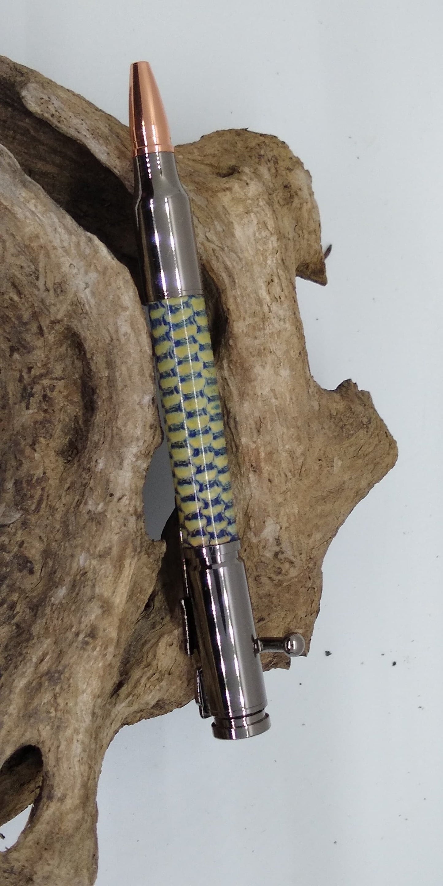 Gun Metal Bolt Action Pen made from a dyed and stabilized Corn Cob