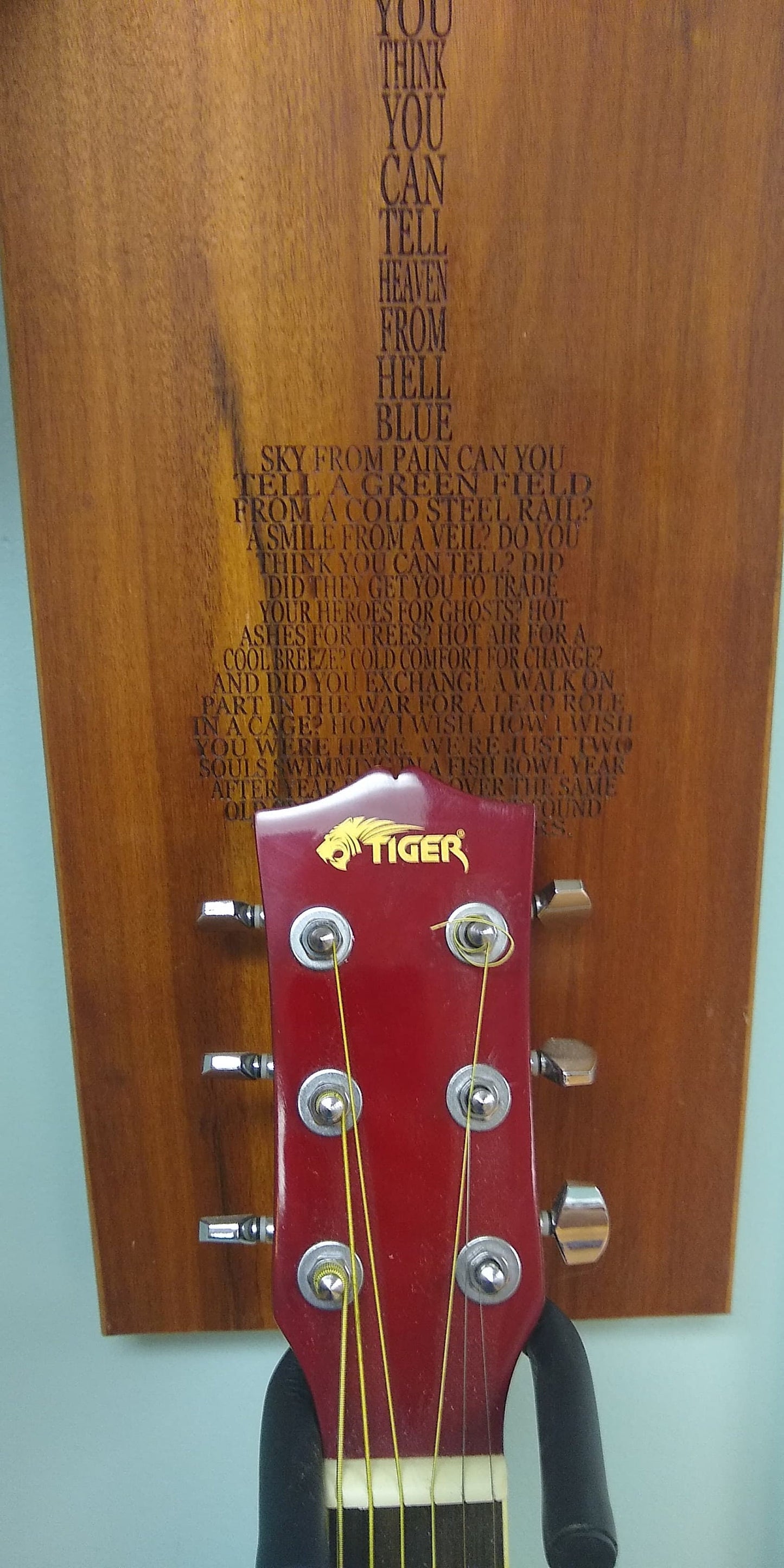 Custom guitar wall hanger on Curapay wood laser inscribed Pink Floyd's "Wish you were Here" lyrics